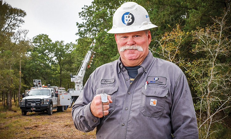 John ‘Johnny’ Horton shows his U.S. Army military I.D. dog tags. He served for four years in the U.S. Army and has been a Bluebonnet employee for almost two years.