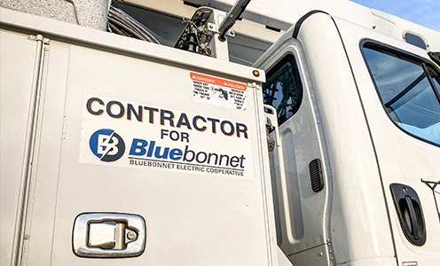 Prime Powerline Utilities, a contractor for Bluebonnet Electric Cooperative, displays both its company logo and Bluebonnet's logo on trucks. 