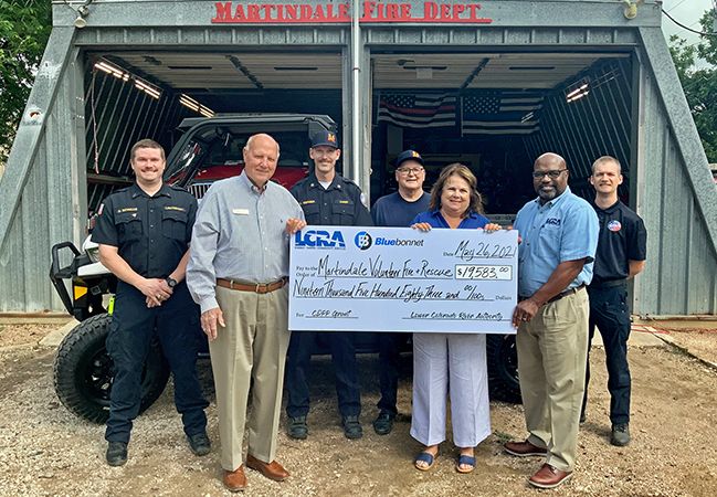 Pictured, from left to right, are: Margaret D. “Meg” Voelter, LCRA board member; Joseph Lamer; city commissioner; Lori A. Berger, LCRA board member; Kenneth Stojanik, city commissioner; Byron Balke, Bluebonnet Board assistant secretary/treasurer; Matt Mikulenka, mayor of Ellinger; and Mark Johnson, Bluebonnet community representative.