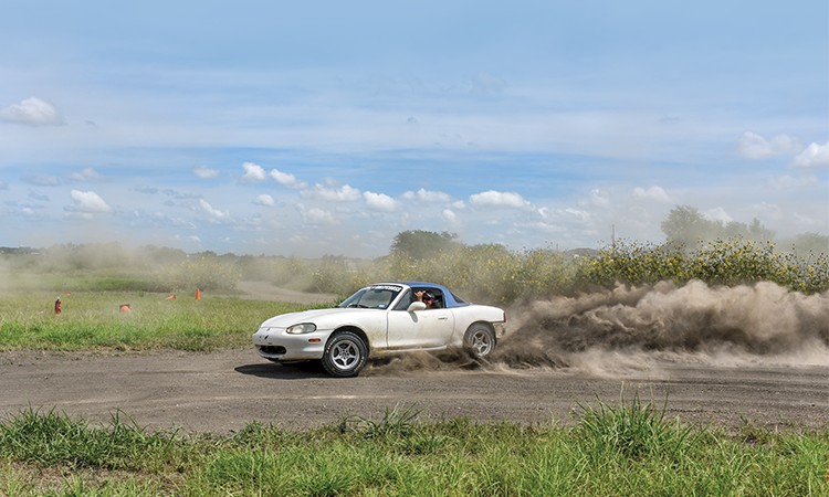 Brianne Corn doing what she loves: skidding around the dirt of her private racetrack. ‘Racing was the one thing I felt compelled to do,’ she said. (Sarah Beal photo)