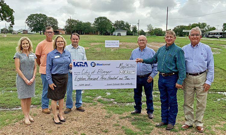 Pictured, from left to right, are: Margaret D. “Meg” Voelter, LCRA board member; Joseph Lamer; city commissioner; Lori A. Berger, LCRA board member; Kenneth Stojanik, city commissioner; Byron Balke, Bluebonnet Board assistant secretary/treasurer; Matt Mikulenka, mayor of Ellinger; and Mark Johnson, Bluebonnet community representative.