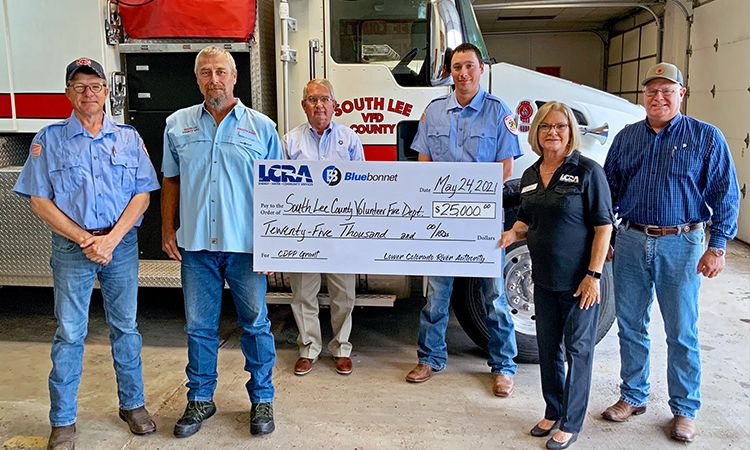 Pictured, from left to right, are: Ronald Zoch, South Lee VFD secretary; Chris Becker, South Lee VFD president; Mark Johnson, Bluebonnet community representative; Mason Becker, South Lee VFD drill captain #2; Lori A. Berger, LCRA board member; and Russell Jurk, Bluebonnet Board member.