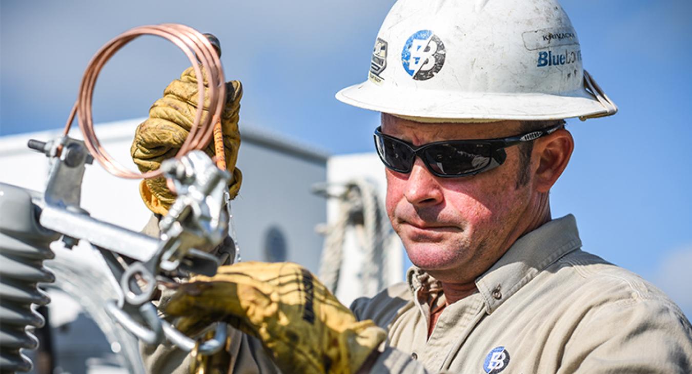 Check Bluebonnet's social media on April 11 for a tribute to our lineworkers. Here, Brandon Krivacka, in Brenham, prepares a transformer to be installed at a location where new construction is taking place. (Sarah Beal photo)