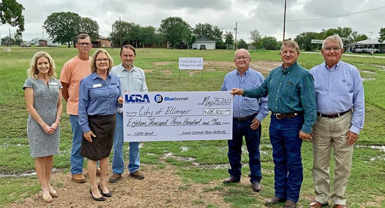 Pictured, from left to right, are: Margaret D. “Meg” Voelter, LCRA board member; Joseph Lamer; city commissioner; Lori A. Berger, LCRA board member; Kenneth Stojanik, city commissioner; Byron Balke, Bluebonnet Board assistant secretary/treasurer; Matt Mikulenka, mayor of Ellinger; and Mark Johnson, Bluebonnet community representative.