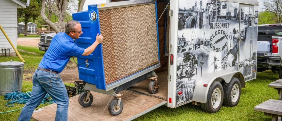 Kyle Merten unloads a fan at an event in Chappell Hill.